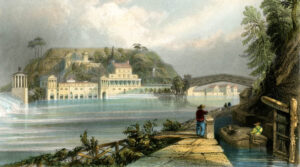 Fairmount Water Works, by W. H. Bartlett, 1839. This engraving from an 1839 painting by William Bartlett shows the porch added to the Engine House about 1835 and the two gazebos built at the same time, all added to welcome visitors to the Water Works and a new saloon, or restaurant, in the Engine House. The powerful jet of water rising from the fountain in the South Garden, fed by a dedicated pipe under the full pressure of the reservoir, was depicted against the green foliage on the west slope of Faire Mount, near the east end of the Colossus. A barge is making its way downstream through the canal, headed under the Colossus to the busy port city of Philadelphia.