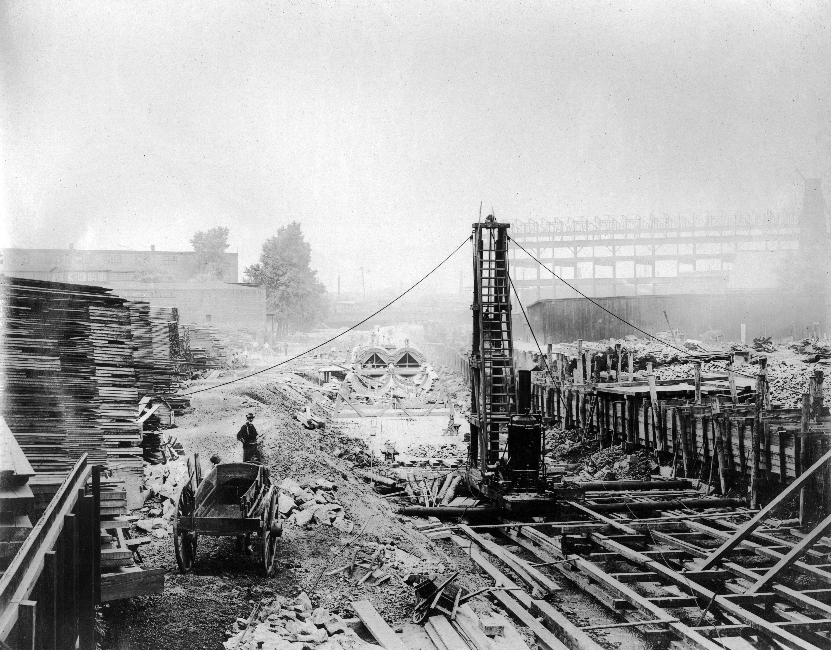 Workers, a cart, and a tower, Aramingo Sewer construction, June 26, 1900