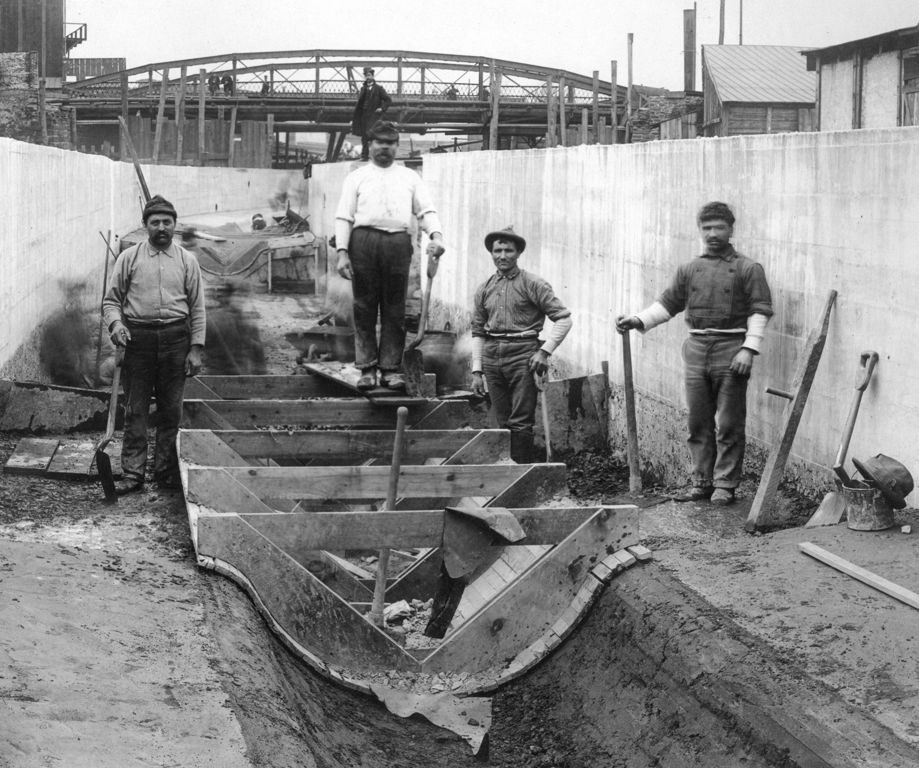 Workers with a digging tool in the Aramingo Sewer, April 13, 1901