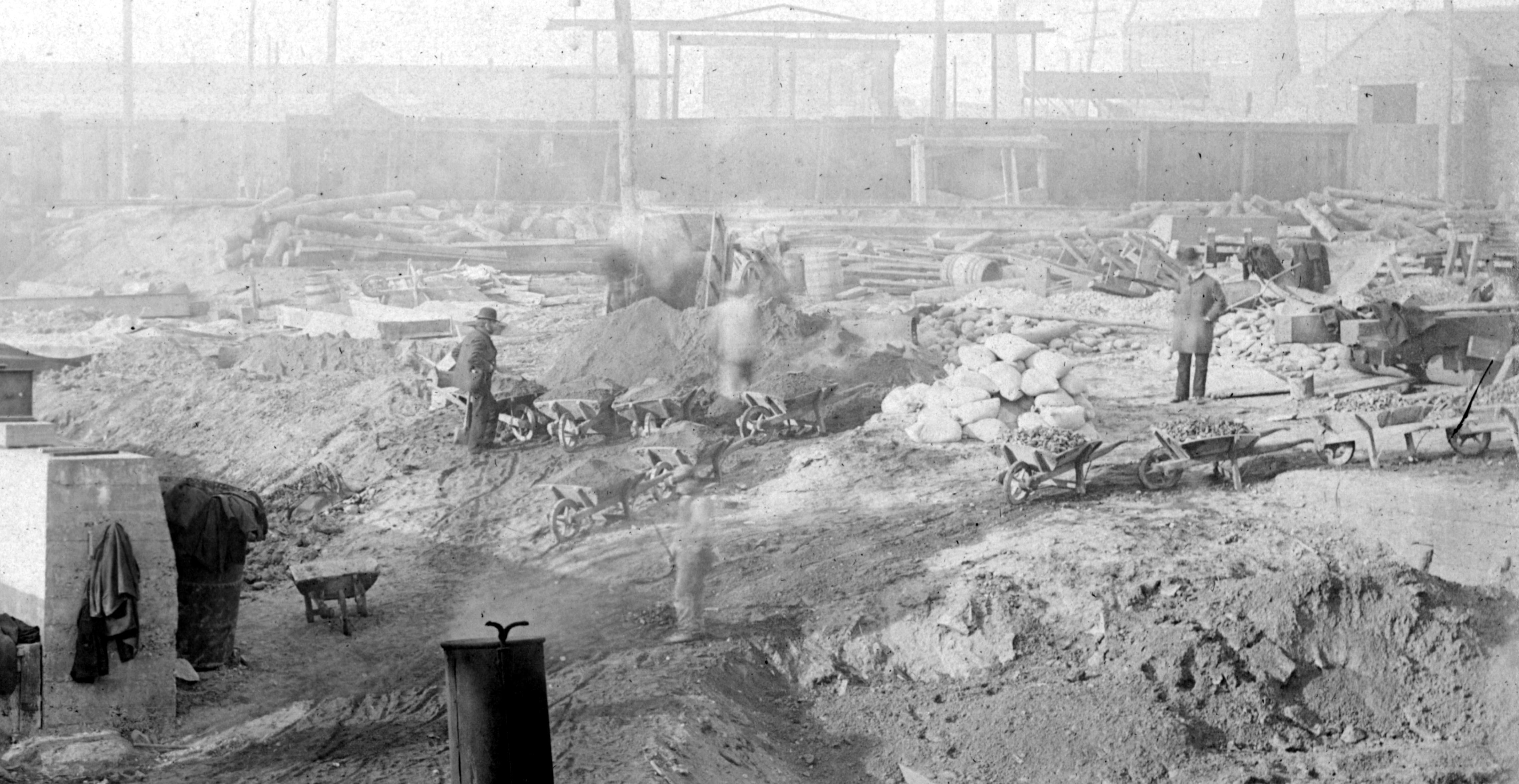 Workers, sandbags and wheelbarrows. Detail from a 1902 image of Aramingo Sewer construction