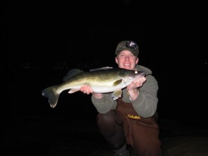 Anglers' Club member Dan Coghlin holding a walleye