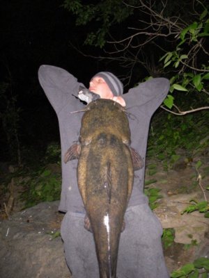 Jude Becker holds a 30+ pound flathead catfish