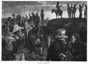 Black-and-white image shows several people talking in the foreground and figures on horses on a hill in the background