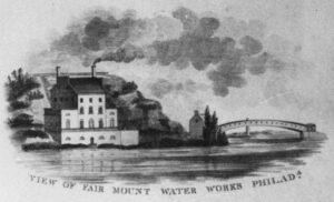 The 1815 Engine House (shown here in an 1819 print) housed two steam-powered pumps that drew water from the Schuylkill River and pumped it into the reservoirs above the building, on top of Faire Mount. The artist showed smoke pouring from the south chimney, indicating that the South Engine was operating. The bridge just downstream was the covered Upper Ferry Bridge, an incredible 340 feet long, also completed in 1815. Designed and constructed by Lewis Wernwag, a native of Germany who had studied engineering there, the bridge opened in 1813. Formally called the Upper Ferry Bridge, it was also known as the “Colossus of Philadelphia” because — like the mythical Colossus of Rhodes — the bridge was held up only by piers at its two ends, with no intermediate supports. Made entirely of wood, the bridge was destroyed by fire in 1838.
